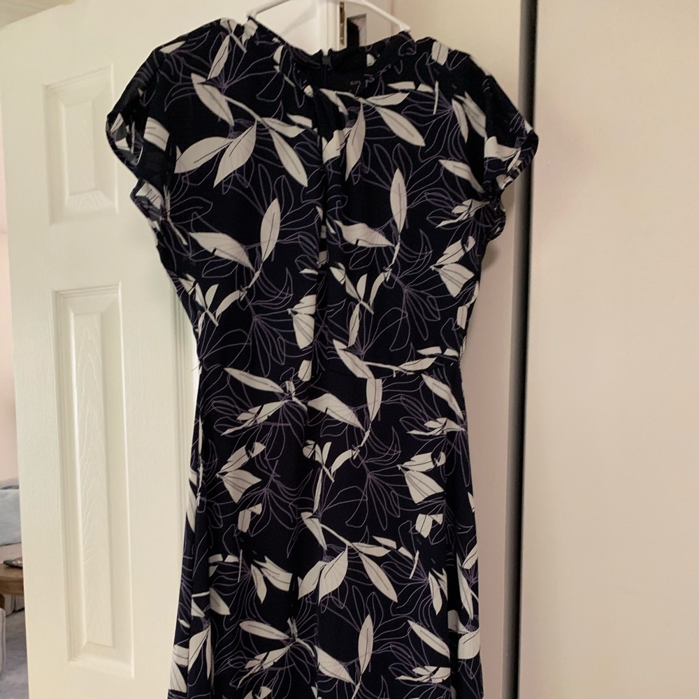 Medium length formal dress.